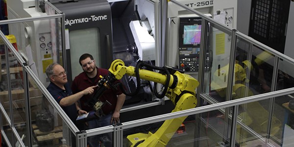 Machine tools, robotics and human interaction are creating an automation thread helping increase manufacturing productivity. Image courtesy Methods Machine Tools.