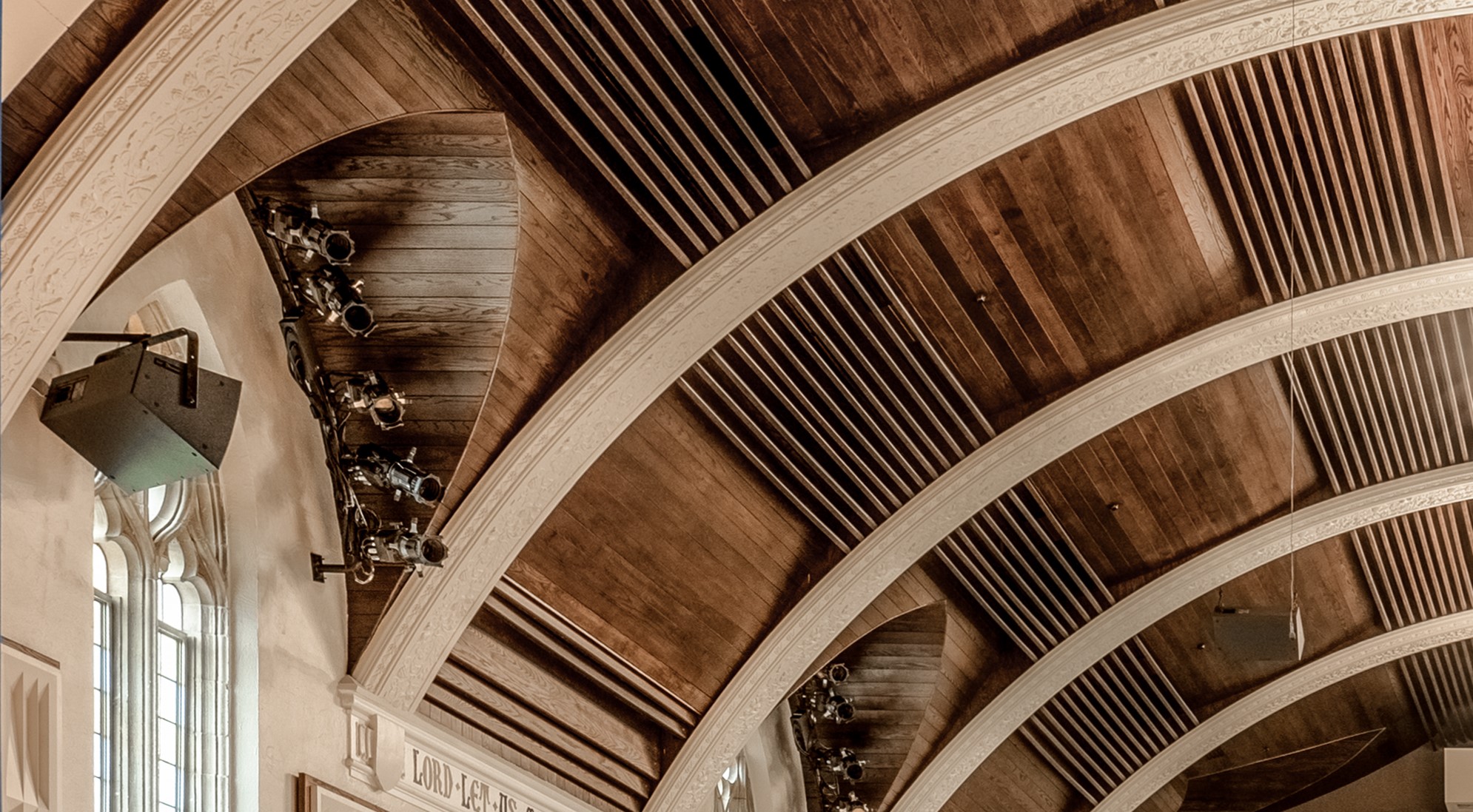 Detail of oak tongue-and-groove acoustic ceiling